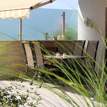 Gartenumgestaltung mit großzügiger Terrasse
