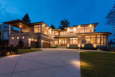 Large trendy three-story mixed siding house exterior photo in Seattle with a metal roof