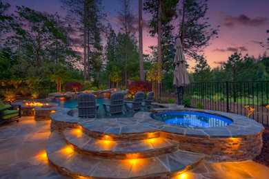 Inspiration for a large rustic pool remodel in Sacramento