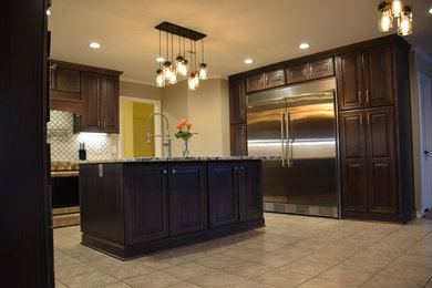 Example of a mid-sized tuscan l-shaped ceramic tile open concept kitchen design in Little Rock with a farmhouse sink, raised-panel cabinets, dark wood cabinets, granite countertops, white backsplash, stainless steel appliances and an island