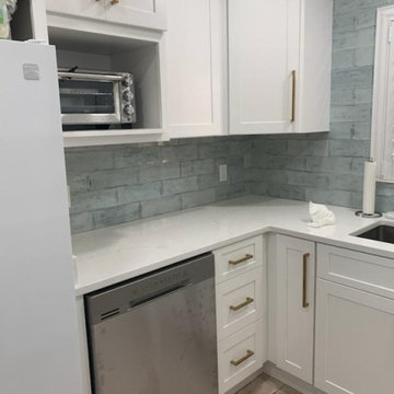 Beautiful backsplash installed using decorative 4 x 12 ceramic wall tiles.
