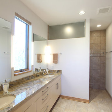 Window between Mirrors and Above Shower Floods Master Bathroom with Light