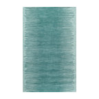 Turquoise and orange area rug