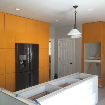 Kitchen Install in Progress:Modern Orange Gloss and White Gloss Kitchen Remodel