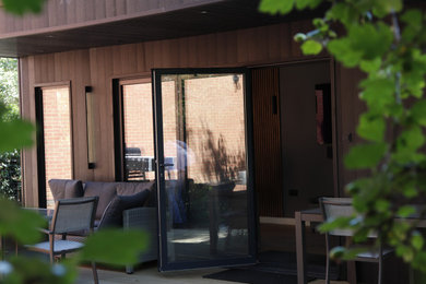 This is an example of a large contemporary detached office/studio/workshop in Hertfordshire.
