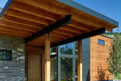 Example of a mountain style entryway design in Other