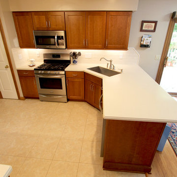 Cherry Kitchen Cabinets with Corian Countertops ~ Broadview Heights, OH