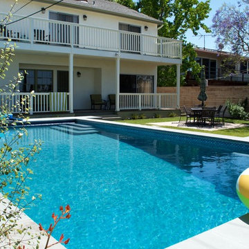 Elevated pool, Mangaris hardwood porch and repurposed flagstone.