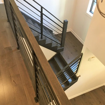 Amanda - horizontal steel railing with wooden newel posts