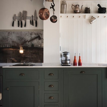 Rustic green kitchen with open plan shelving
