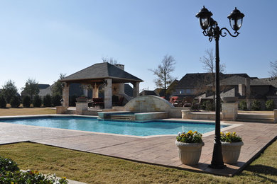 Example of a mountain style pool design in Dallas