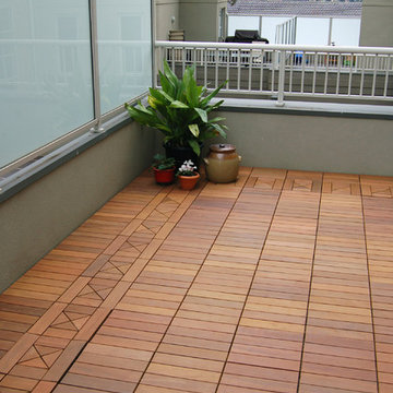 Ipe wood deck tiles on a small condo balcony