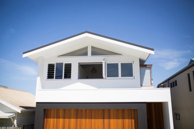 This is an example of a beach style exterior in Sydney.