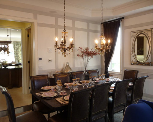 chandeliers over dining room tables
