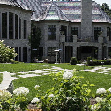 Full Landscape with Patio, Outdoor Kitchen, Stone Driveway and Planting