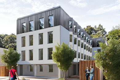 Design ideas for a contemporary house exterior in Surrey.