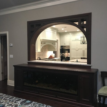 Family room side of arch with fish tank