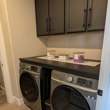 Laundry Room with Charcoal Cabinets