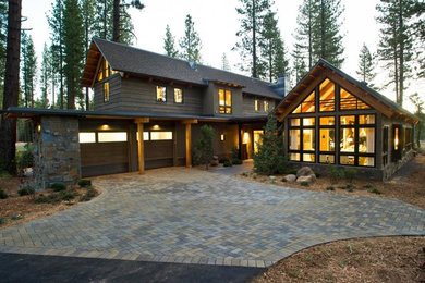 Design ideas for a large country brown exterior in Sacramento with wood siding.