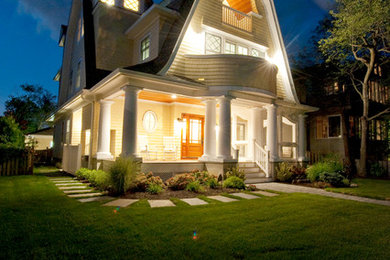 Traditional yellow exterior home idea in New York