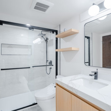 Frameless Glass Shower and Quartz Vanity – Woodcroft Capilano Condo Bathroom Ren