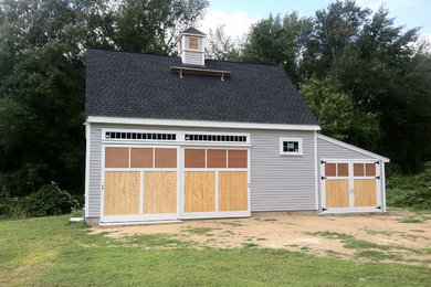Example of a cottage exterior home design in Boston