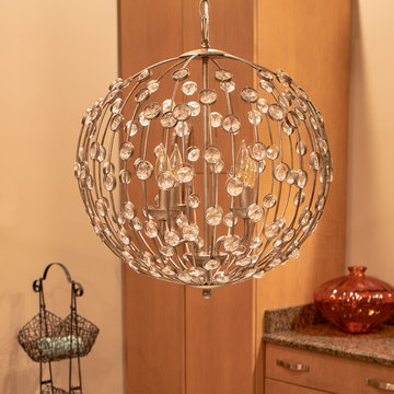 Lucille Steel and Crystal Orb Pendant