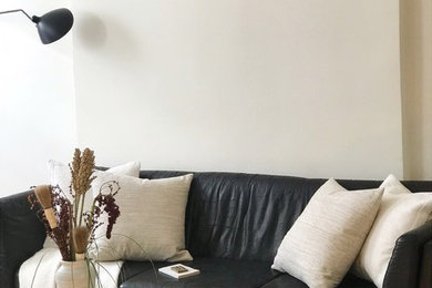 Living room - eclectic living room idea in New York