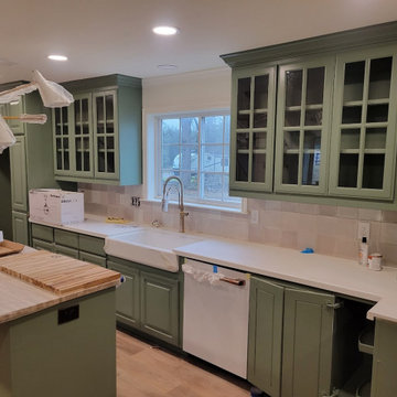 Sage Green Kitchen Wall with Appliance Garage & Glass Front Cabinets