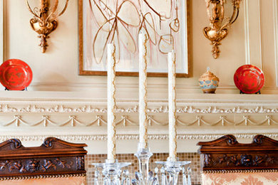 Enclosed dining room - traditional medium tone wood floor enclosed dining room idea in Dallas with beige walls, a standard fireplace and a tile fireplace