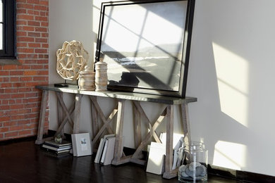 Mid-sized transitional dark wood floor entryway photo in Columbus with white walls
