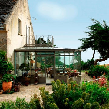 Véranda de style victorien en acier et fer forgé