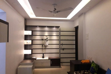 Living room - contemporary living room idea in Mumbai