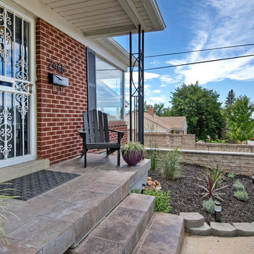 Red Brick Exterior | Tiled Porch | Black Modern House Numbers and Mailbox