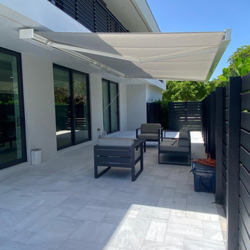 Contemporary Poolside Retractable Awning Installation