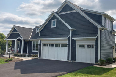 Example of a transitional exterior home design in Cleveland