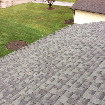 120 volt Raychem ice cables over leaf guard style gutters.