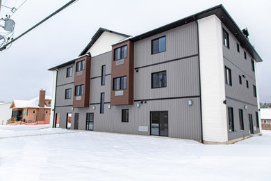 Transitional exterior home idea in Ottawa