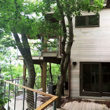 Three levels of decks overlooking the lake.