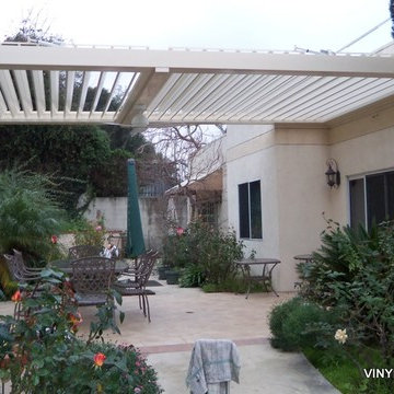ADJUSTABLE (MOTORIZED) PATIO COVERS
