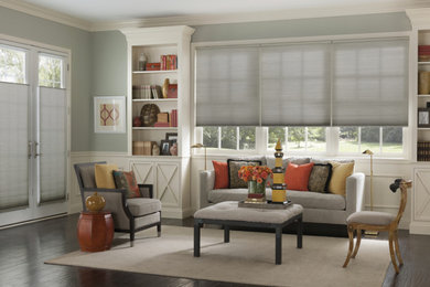 Example of a transitional family room design in Charleston