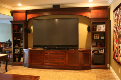 Photo of a mid-sized contemporary open concept family room in Other with a freestanding tv.