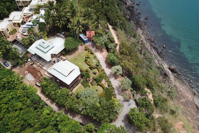 This is an example of a large tropical home design in Cairns.