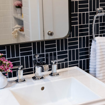 Classic and Fresh Bathroom with an exciting Navy Tile Wall