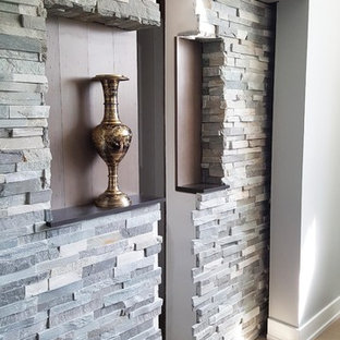 Design ideas for a large traditional look-out basement in Chicago with grey walls, bamboo flooring and no fireplace.