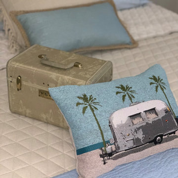 Details make the room. The suitcases holds bath products for the ensuite bath.