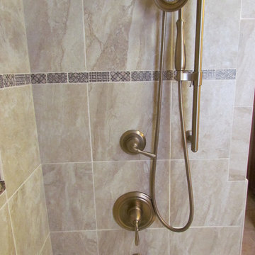 Transitional Brazilia Bathroom Remodel with Brushed Bronze Plumbing Fixtures