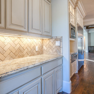 Traditional Brick & Stone with a Glamorous Interior