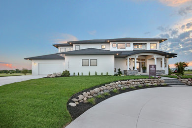 Transitional white two-story concrete fiberboard exterior home photo in Grand Rapids