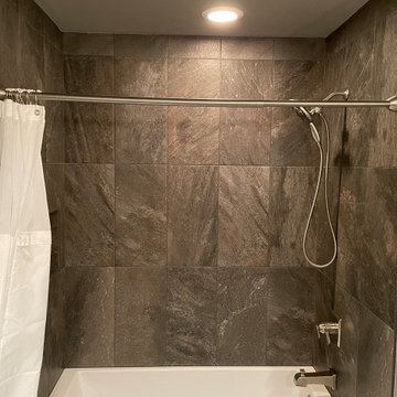 BATHROOM - New Tub, 12x24 Dark Tile, Gray Plank Floor Tile, Tebas Black Granite